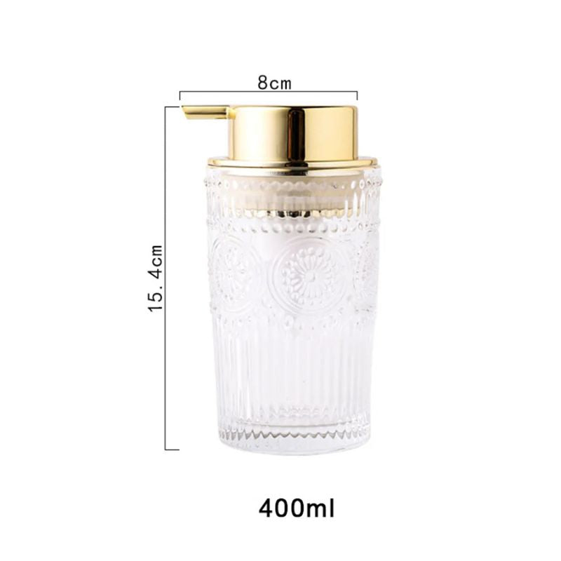 Clear glass soap dispenser with ornate patterns and a gold pump, isolated on a white background. Dimensions: 8cm width, 15.4cm height, and 400ml capacity.