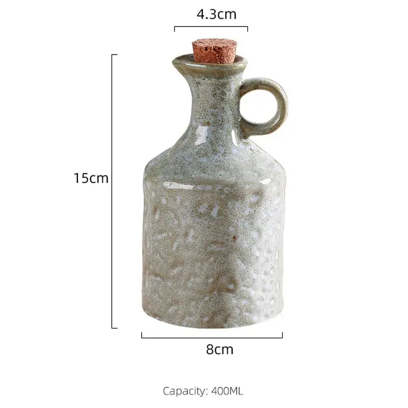 Ceramic bottle with cork stopper and dimensions on a white background