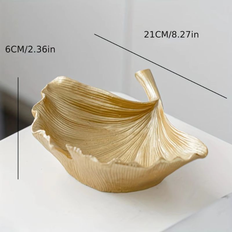 Gold-colored ginkgo leaf-shaped decorative bowl with textured details, measuring 21 cm (8.27 in) in length and 6 cm (2.36 in) in height.