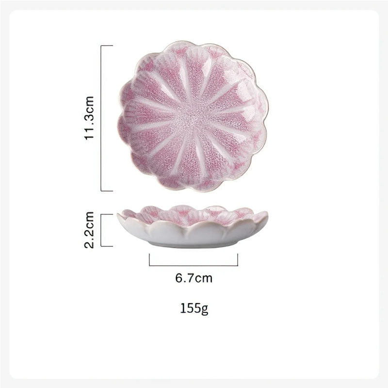 Dimensions diagram for a pink, flower-shaped condiment dish showing a length of 11.3cm, height of 2.2cm, bottom width of 6.7cm, and weight of 155g.