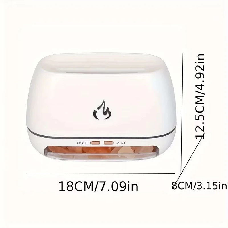 A compact white Himalayan salt humidifier and diffuser with a modern design. It features a soft flame logo on the front, light and mist control buttons, and a visible salt stone compartment. Dimensions are labeled, showing a length of 18 cm (7.09 in), a width of 8 cm (3.15 in), and a height of 12.5 cm (4.92 in).