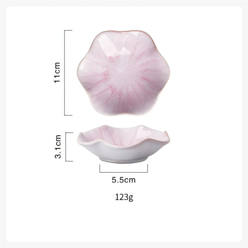 Dimensions diagram for a pink, flower-shaped condiment dish showing a length of 11cm, height of 3.1cm, bottom width of 5.5cm, and weight of 123g.