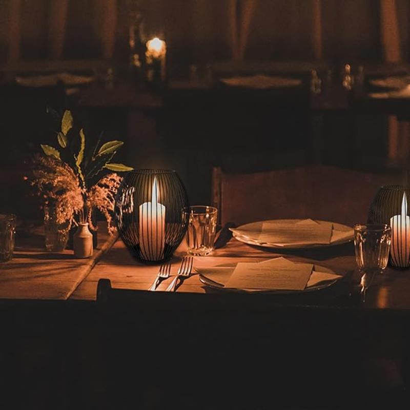 Minimalist iron candle holder, ideal for showcasing candles and creating a sophisticated mood in any space.