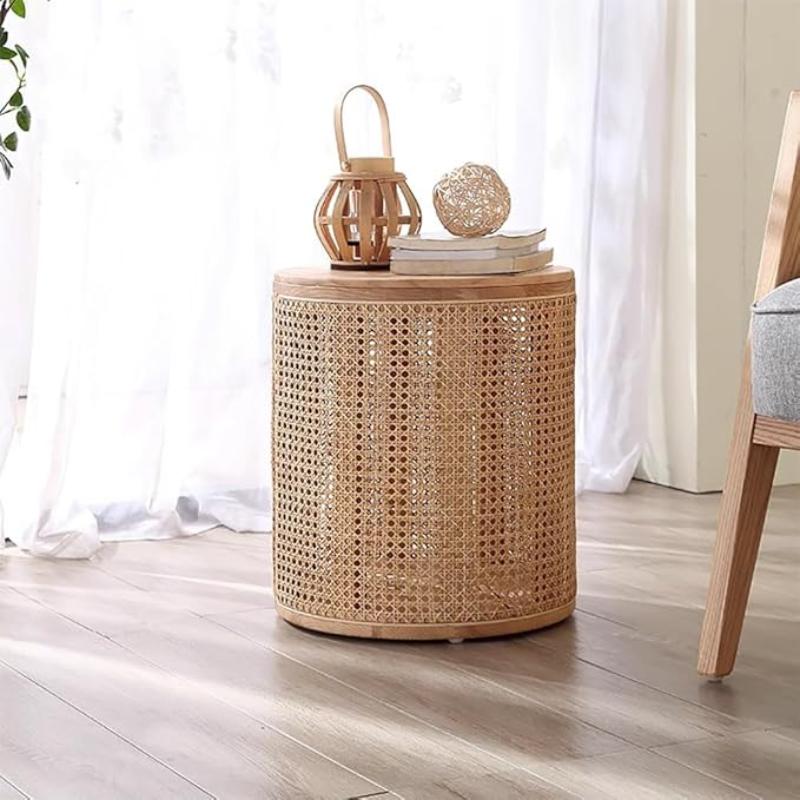 Natural rattan storage side table for boho and neutral interiors.