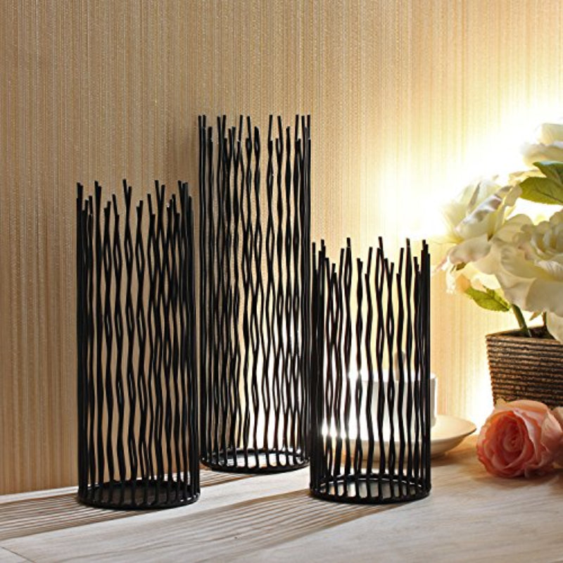 Iron candle stands with a sturdy base, ideal for safely displaying your favorite candles in a modern style.