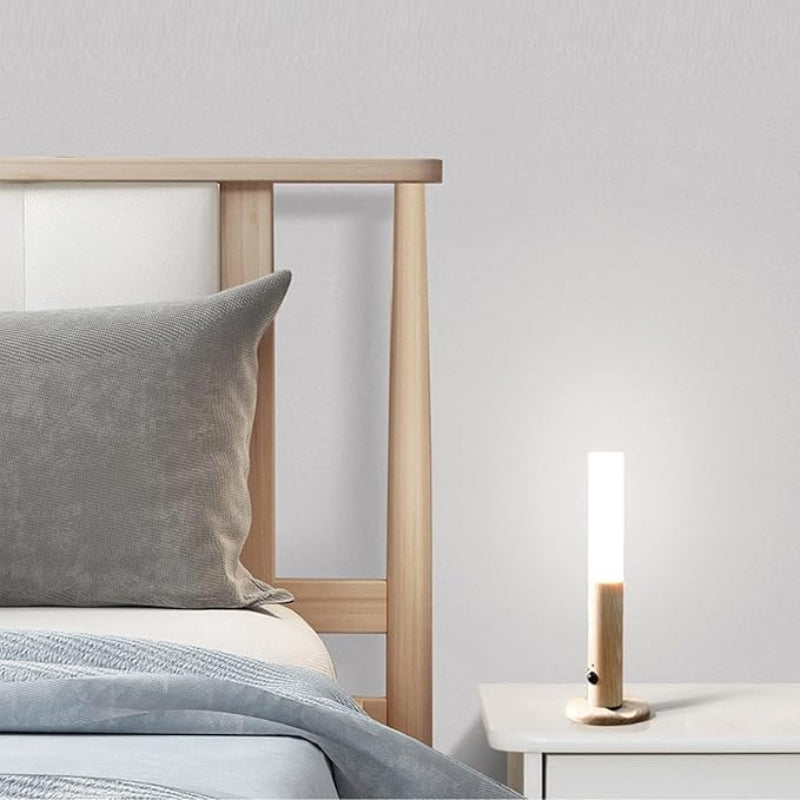Sleek Lumi Motion Sensor Light in oak or walnut finish, offering convenient USB charging.