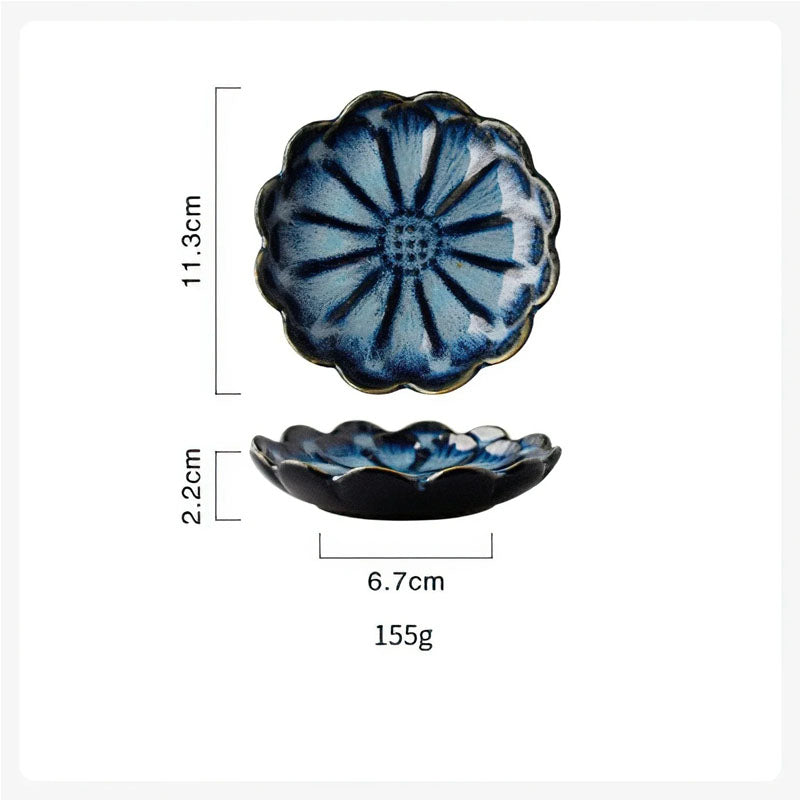 Dimensions diagram for a blue, flower-shaped condiment dish showing a length of 11.3cm, height of 2.2cm, bottom width of 6.7cm, and weight of 155g.
