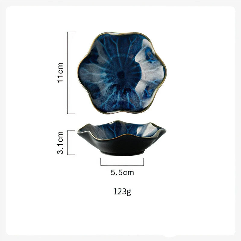 Dimensions diagram for a blue, flower-shaped condiment dish showing a length of 11cm, height of 3.1cm, bottom width of 5.5cm, and weight of 123g.