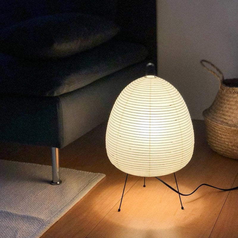 Sleek Akari lamp with a textured shade, offering timeless elegance to home decor.