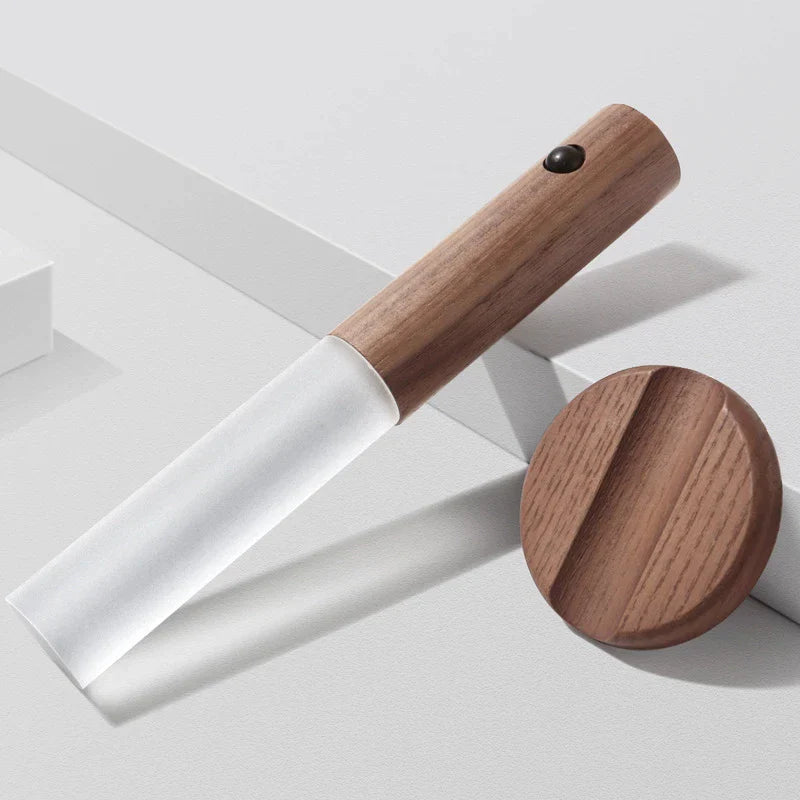 Lumi Motion Sensor Light with natural wood design and energy-efficient LED for up to 8 hours.