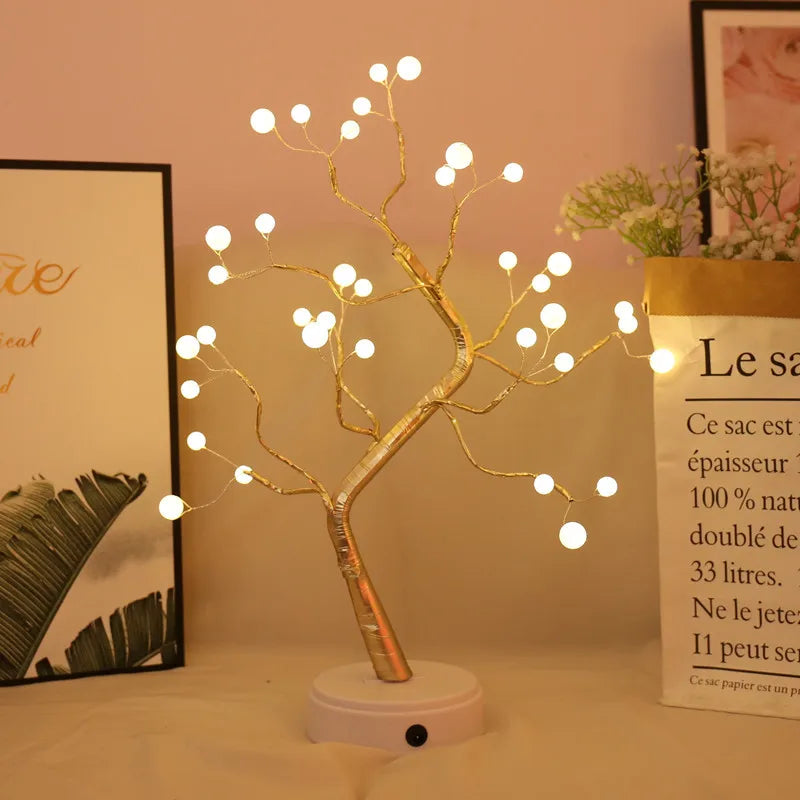 Decorative firefly tree lamp illuminating a room with a gentle, fairy-tale glow.