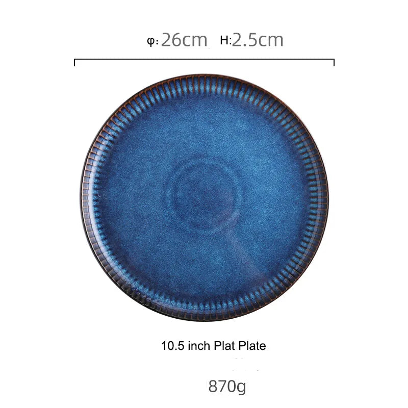 A shiny, blue ceramic plate with a fluted rim is shown with its dimensions.
