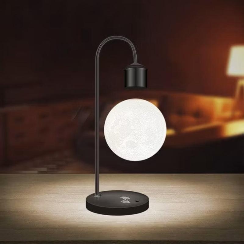 Futuristic levitating moon lamp with integrated wireless charging, perfect for adding a modern touch to any desk or nightstand.