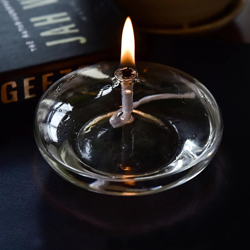 Minimalist oil candle with a steady, flicker-free flame for a serene setting.