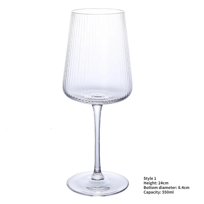 A large, clear wine glass with a ribbed, slightly conical bowl, a delicate stem, and a wide, flat base. Product specifications in the bottom right corner state "Style 1, Height: 24cm, Bottom diameter: 8.4cm, Capacity: 550ml."