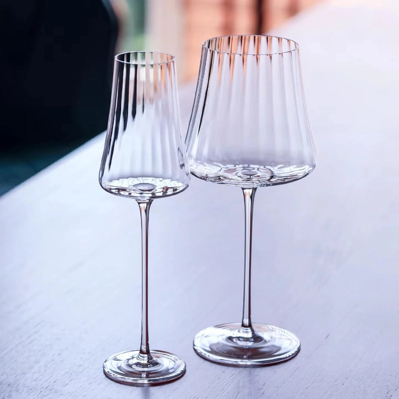 Two fluted wine glasses.