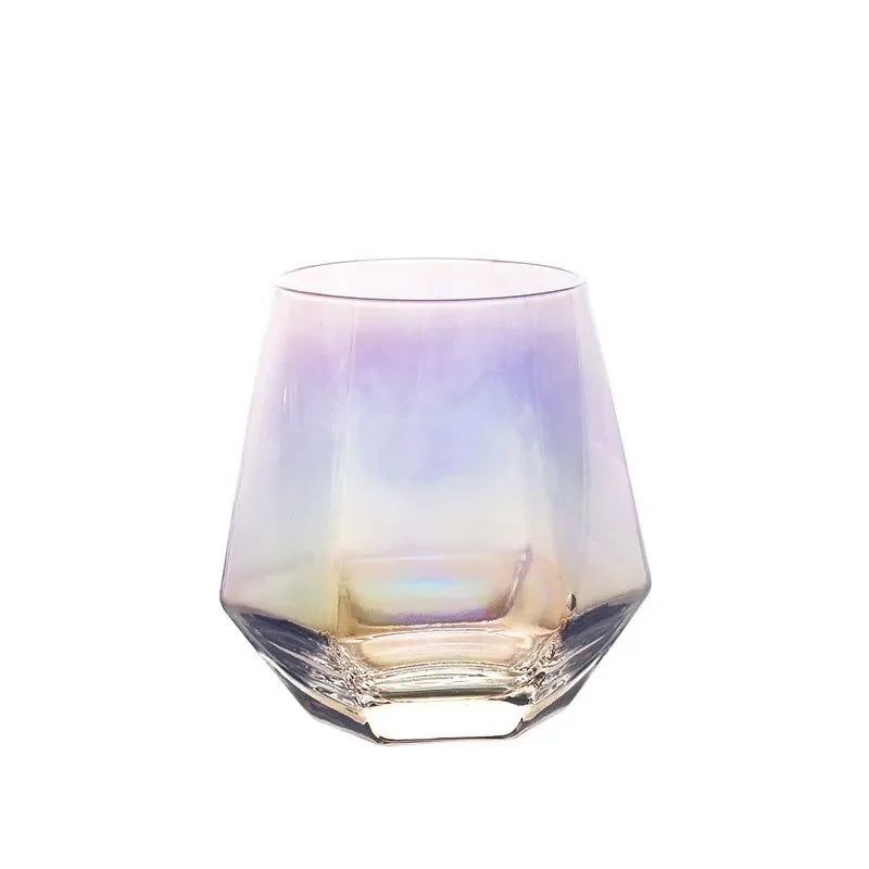 Iridescent hexagonal glass on a white background. The glass displays rainbow-like colors with a gradient effect.