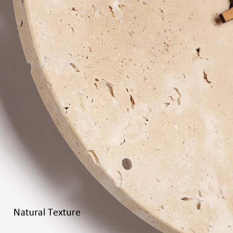 A close-up shows the natural, porous texture of a light-colored stone clock face. A small portion of a wooden clock hand is visible at the top. The text "Natural Texture" is at the bottom left.