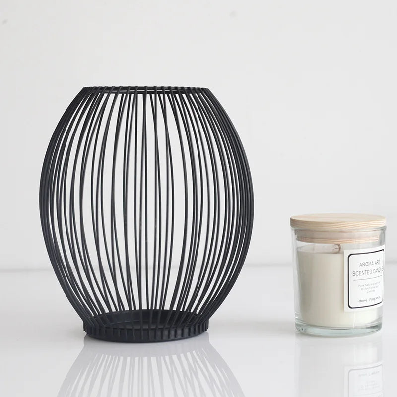 Modern iron candle holder, designed to provide a timeless and minimalistic touch to your home decor.