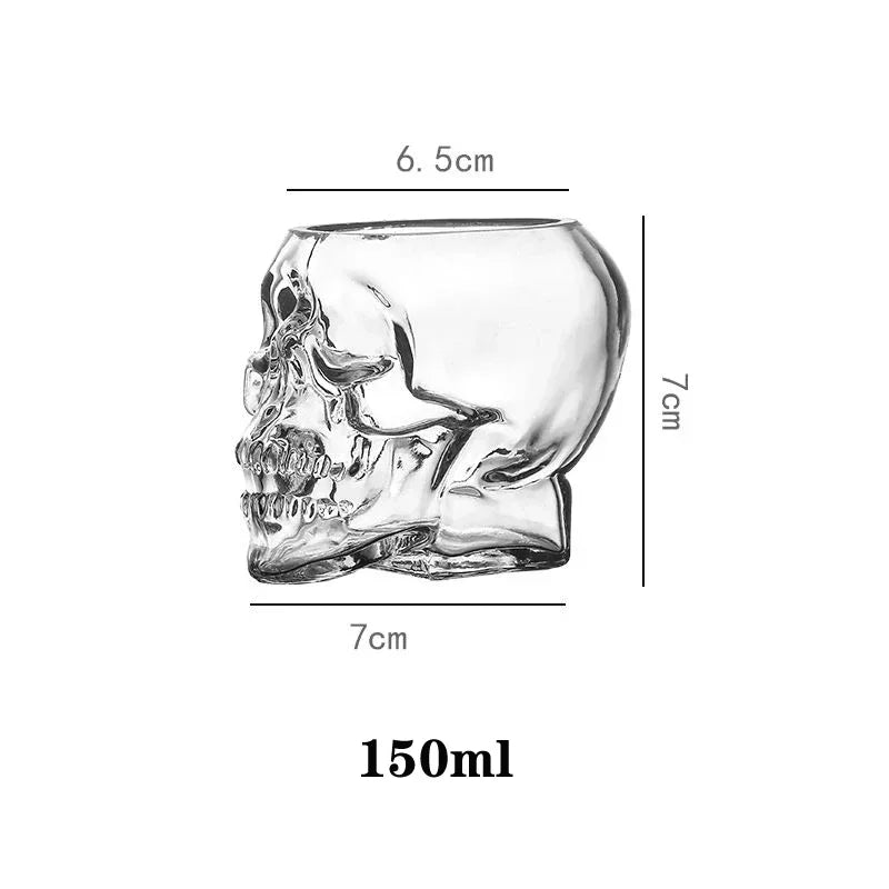 A diagram of a clear glass skull cup, showing its dimensions: 7cm tall, 7cm wide, 6.5cm deep at the top, and a capacity of 150ml.