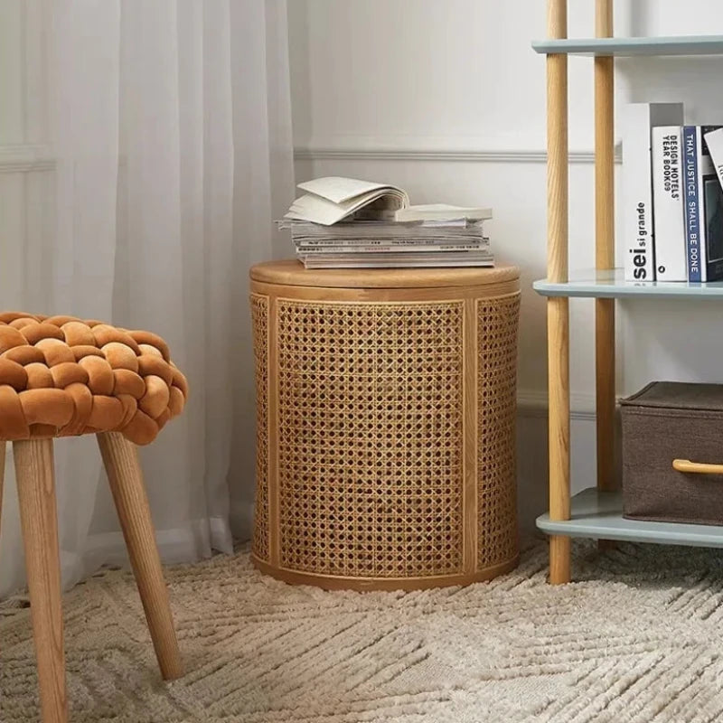 Versatile round rattan storage table for organizing and decorating.