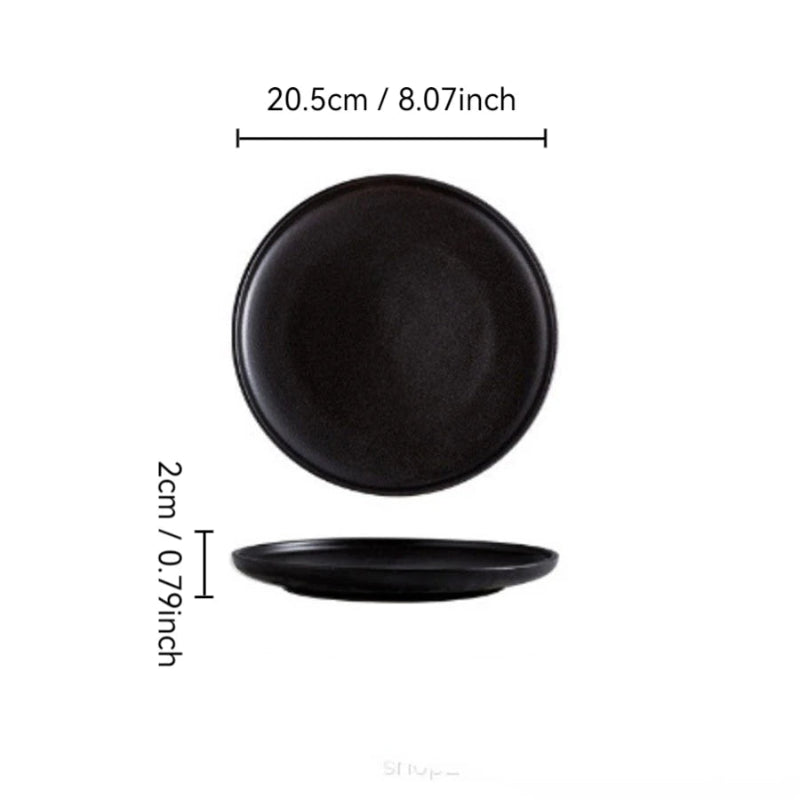 A round, black plate with a textured, matte finish, measuring 20.5cm (8.07 inches) in diameter and 2cm (0.79 inches) in height.