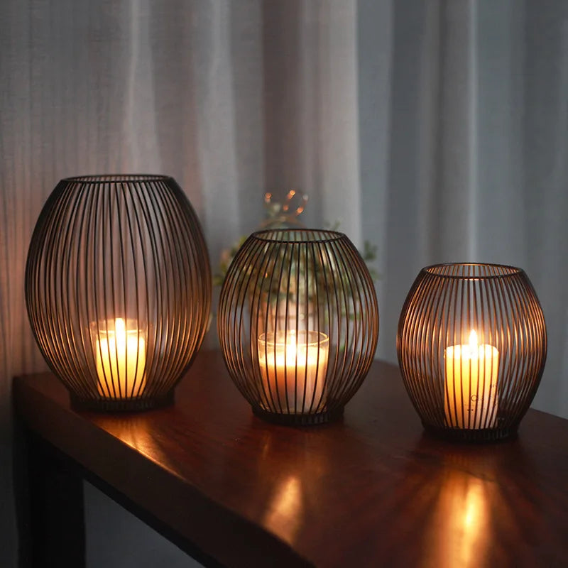 Iron candle holder with a simple yet elegant design, perfect for enhancing the ambiance of your living room or dining area.