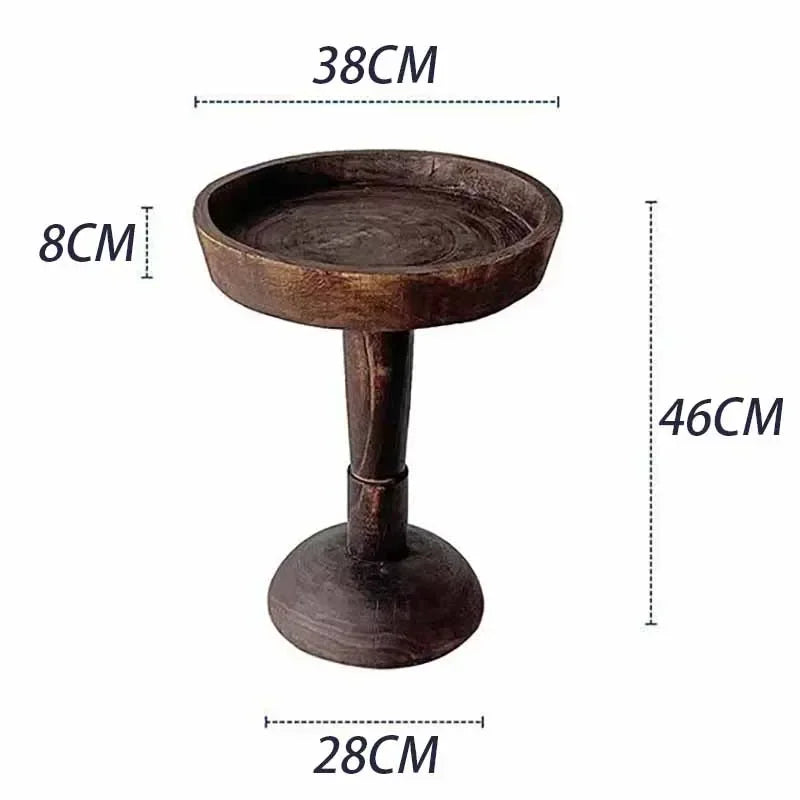 A rustic, dark wood, round side table (Momo Wabi-sabi Log Small Coffee Table) with a shallow tray top, shown with dimensions: 38cm width, 8cm tray depth, 46cm height, and 28cm base diameter.