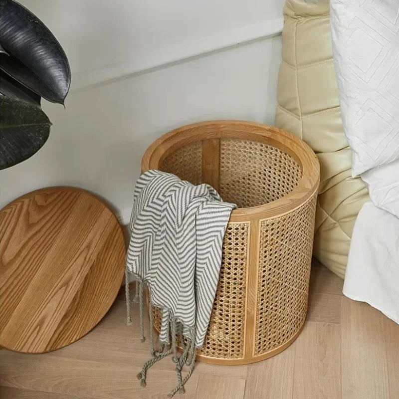 Minimalist rattan side table with ample storage space inside.