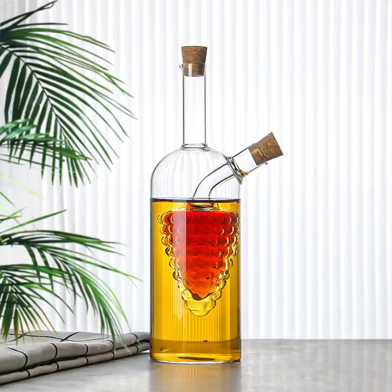 Glass decanter with a unique design on a table with a plant in the background