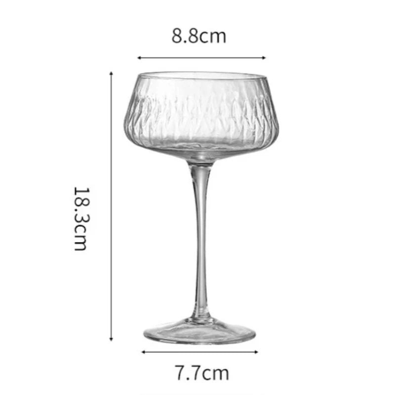 Elegant cocktail glasses with intricate garden motifs, sold in a set of two.
