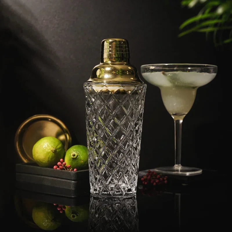 Elegant glass cocktail shaker featuring measurement markings for precise drink making.