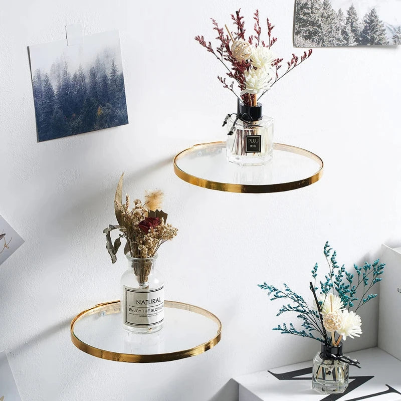 Sleek glass hanging shelf with minimalistic design, perfect for displaying decor or small plants.