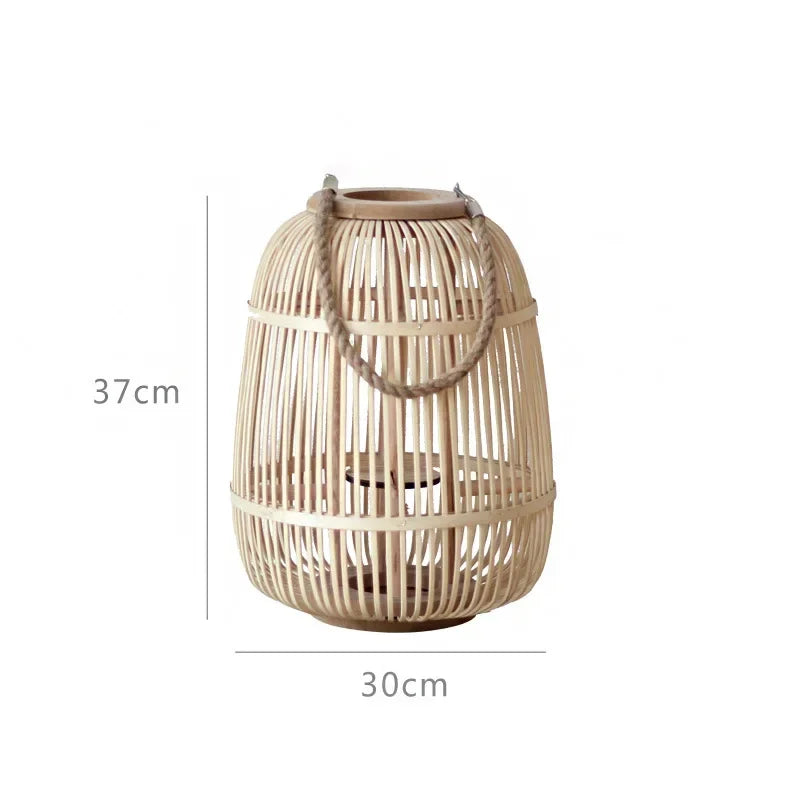 Tall woven bamboo lantern, 37cm high and 30cm wide, with a sturdy rope handle and glass candle holder for a cozy ambient glow.