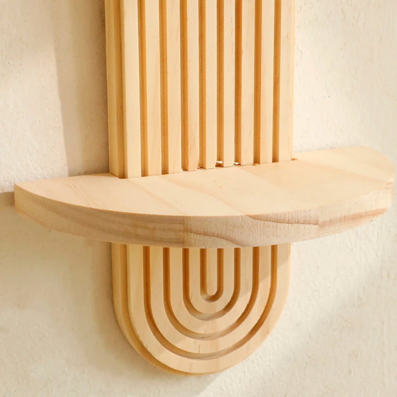 Geometric wood wall-mounted shelf set for modern home interior.