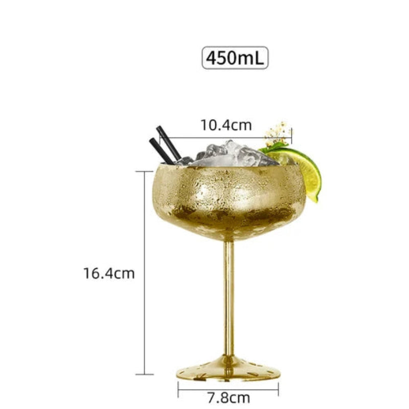 A product image of a gold-colored metal cocktail glass with dimensions labeled.