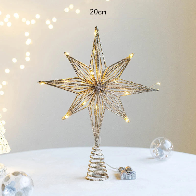 Illuminated gold glitter wire star tree topper with 20cm measurement.