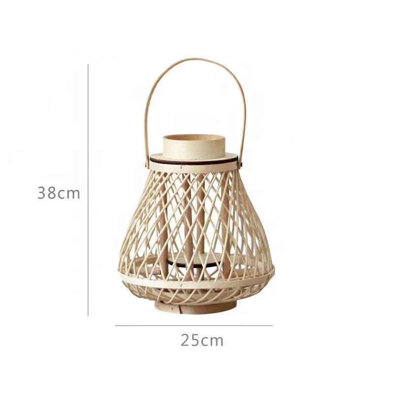 Woven bamboo lantern, 38cm tall and 25cm wide, featuring a curved handle and glass candle holder for a warm, natural glow.