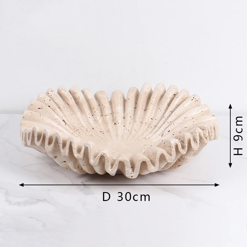 Carved travertine bowl – A luxurious accent piece for modern interiors.