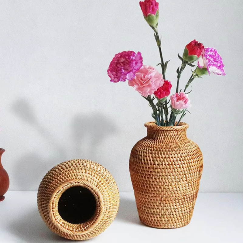 Durable woven rattan vase that complements both rustic and contemporary interiors.