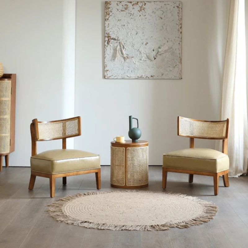 Boho-inspired rattan side table with hidden storage compartment.