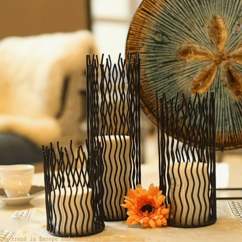 Iron candle stands with clean lines and a modern design, ideal for brightening up your space with style.