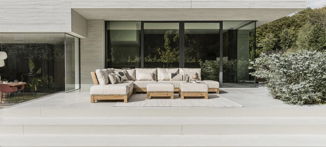 Outdoor patio set with stylish seating, cozy cushions, and nature-inspired decor from Kiyo Home.
