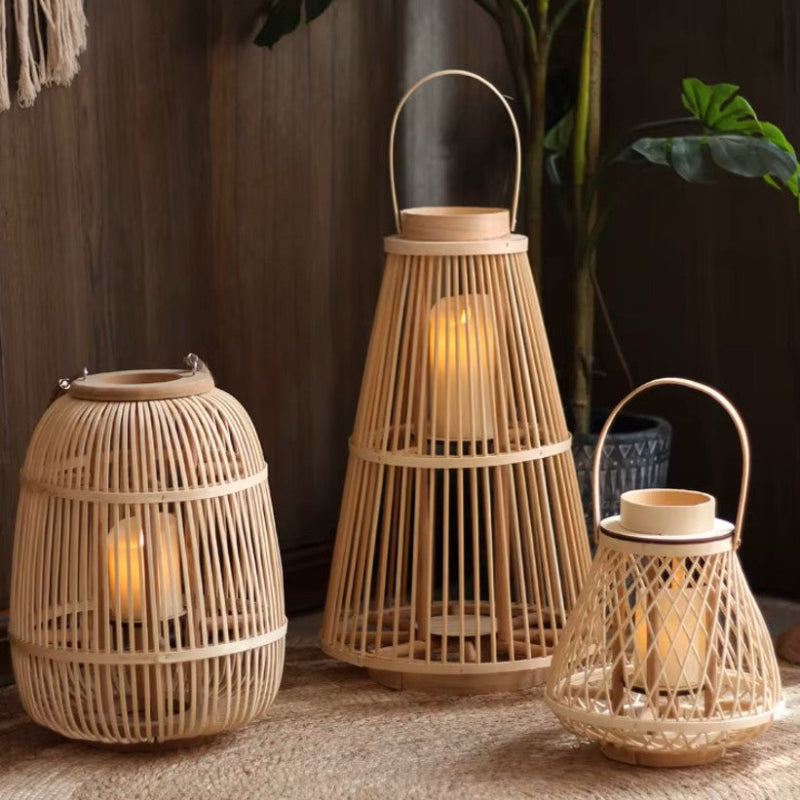 Set of three bamboo lanterns with warm candlelight, creating a cozy and rustic atmosphere. Perfect for natural, bohemian-inspired decor.
