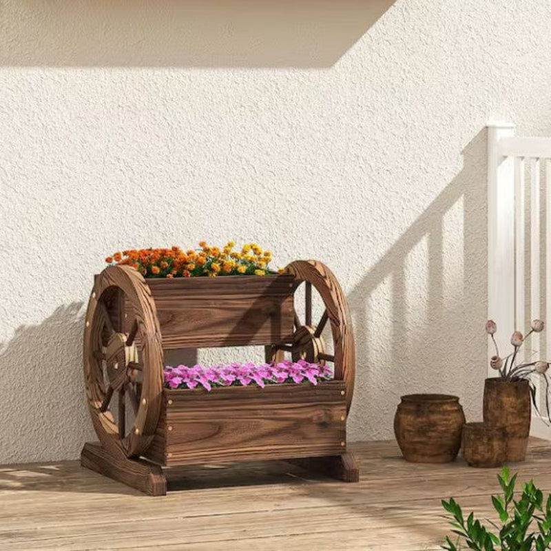 Wooden planter with wheels on a wooden deck against a white wall