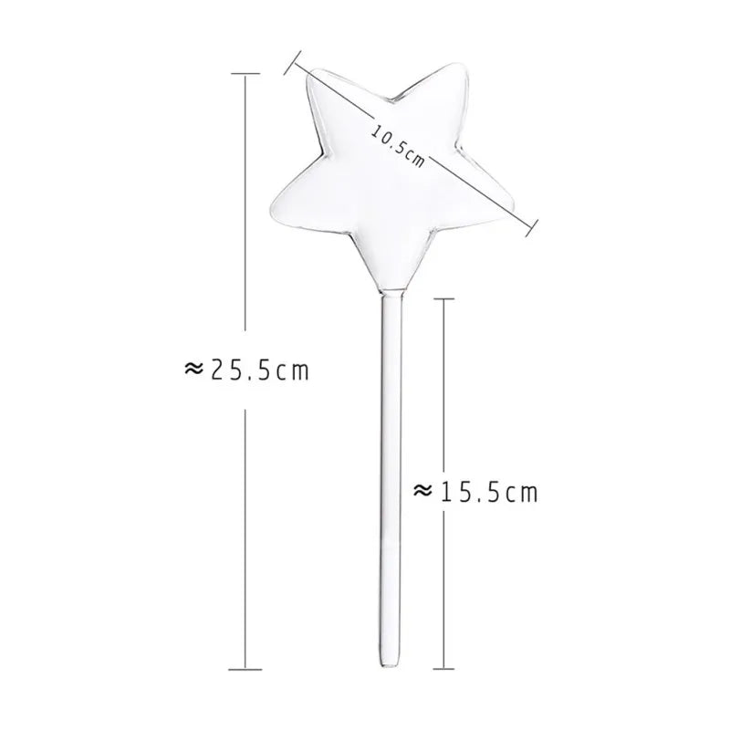 A clear glass, star-shaped plant waterer is displayed with approximate measurements: the longest point of the star to the opposite point is about 10.5 cm, the length of the spike is approximately 15.5 cm, and the total length of the waterer is roughly 25.5 cm.