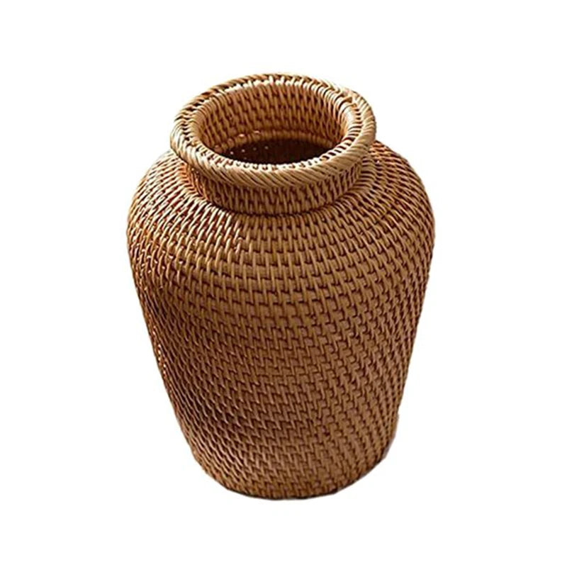 Chic rattan vase with a natural finish, perfect for minimalist and coastal spaces.