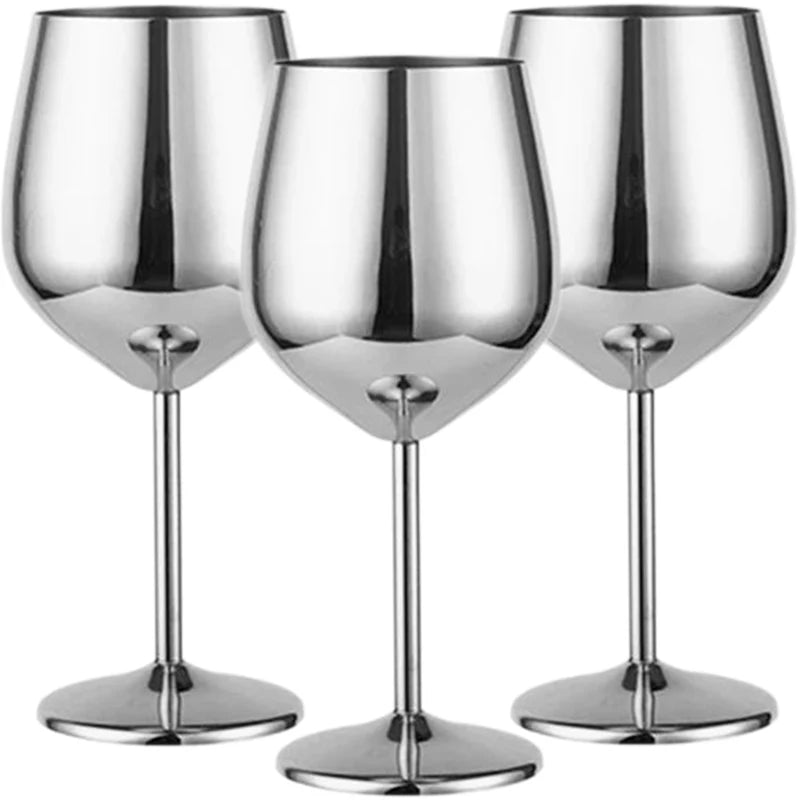 A set of three stainless steel wine glasses with a polished silver finish, featuring a modern, reflective design with long stems—perfect for elegant dining and special occasions.