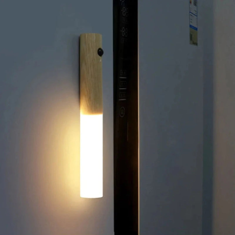 Lumi Wood Motion Sensor Light providing subtle warm glow for under cabinets and staircases.