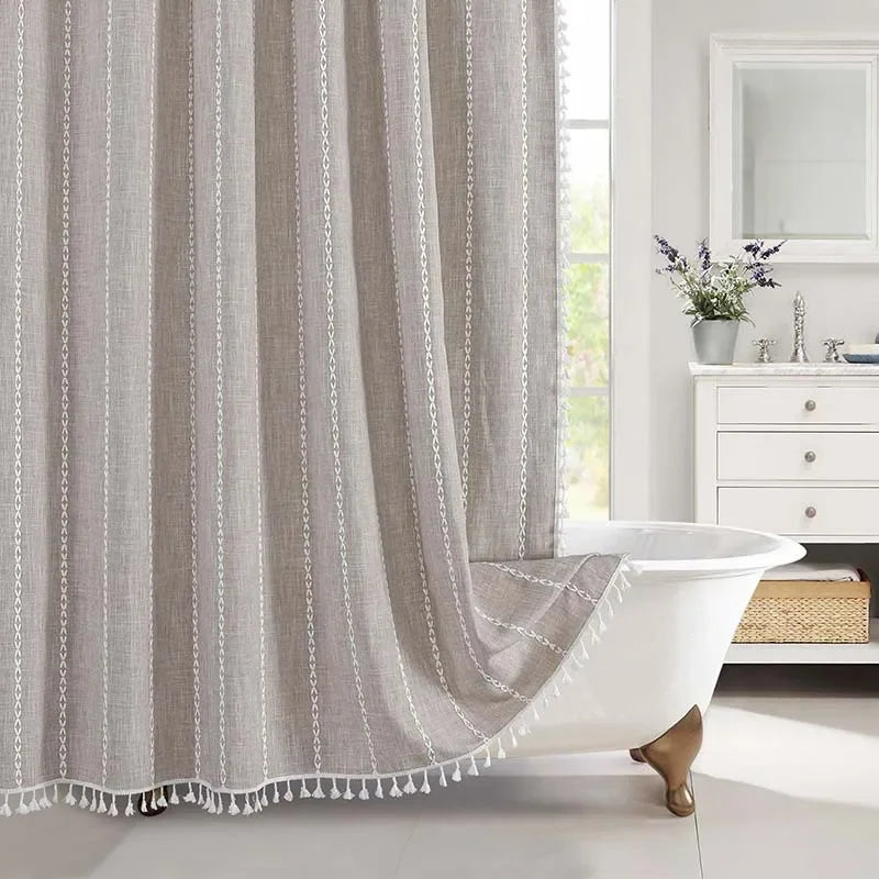 Striped curtain with tassels in a bathroom setting